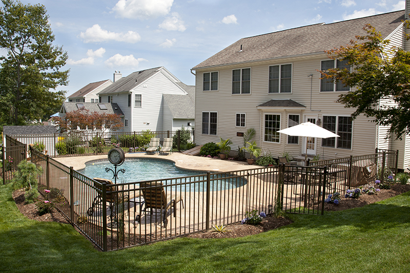 Swimming pool and stamped concrete project example 18